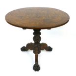 A 19th century mahogany and marquetry inlaid circular tilt top occasional table, top inlaid with