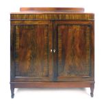 A Victorian mahogany bookcase cupboard, galleried top, a pair of panelled cross banded drawers