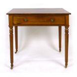 An Edwardian mahogany side table with single frieze drawer with brass loop handles and tapering