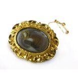 19th century locket with a curl of hair