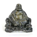 A Chinese bronze figure of a seated Budd