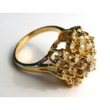 A 14ct yellow gold ring set small diamon