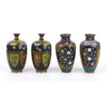Two pairs of Cloisonne vases of baluster form, the first decorated with butterflies and flowers, the