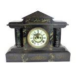 A black slate and marble inlaid mantle clock, late 19th century, of temple form, 4 1/2" ivorine