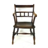 An ash and elm kitchen chair, 19th century, bar and bobbin turned back, solid seat and H-