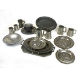 A mixed parcel of pewter wares of various dates, Georgian and later, to include serving platters,