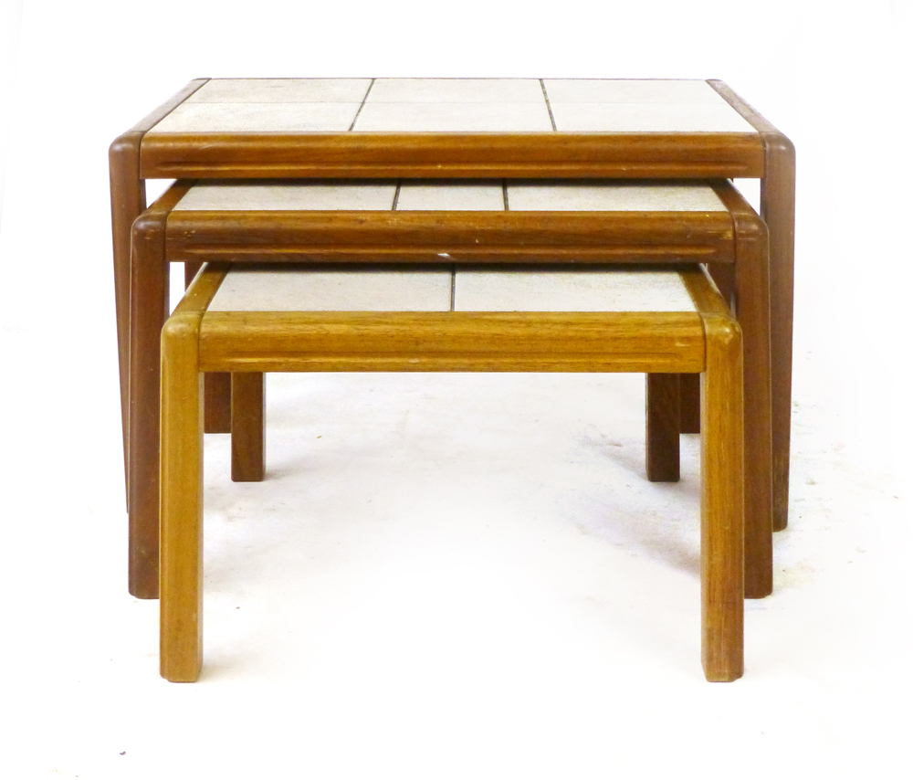 A nest of three Danish tile topped and teak framed coffee tables, max. w. 66 cm CONDITION REPORT: