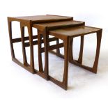 A nest of three G-Plan teak coffee tables of typical form, w. 52.3 cm CONDITION REPORT: Structurally