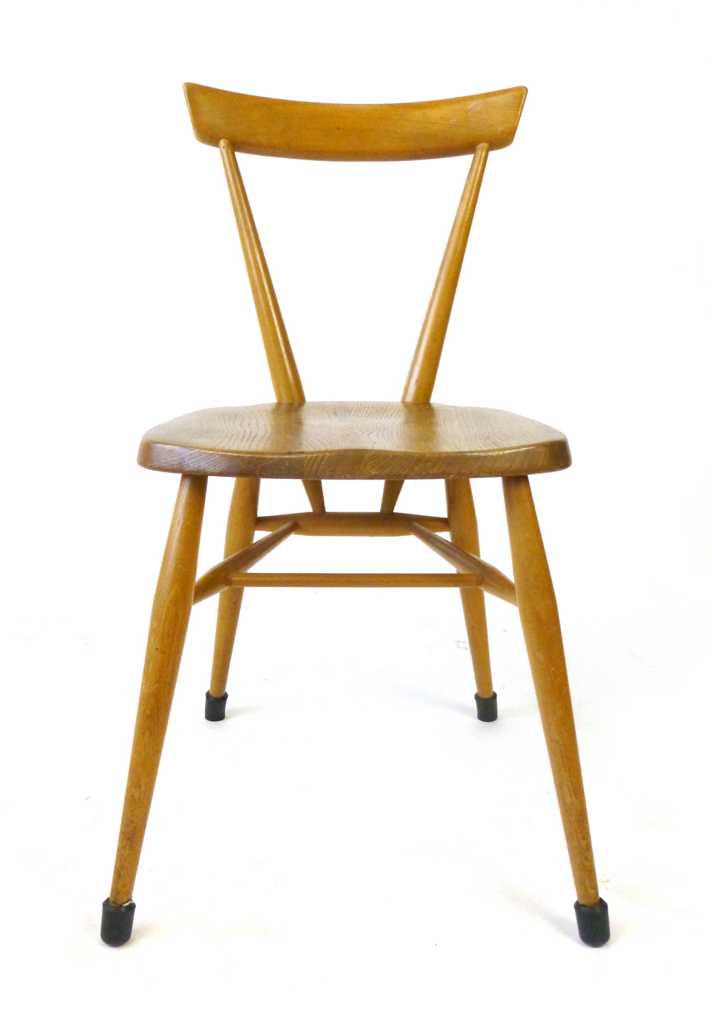 An Ercol elm and beech stacking chair with single back rest on tapering legs CONDITION REPORT: