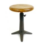 A pine topped circular stool on a cast iron base converted from a Singer sewing machine, d. 35 cm