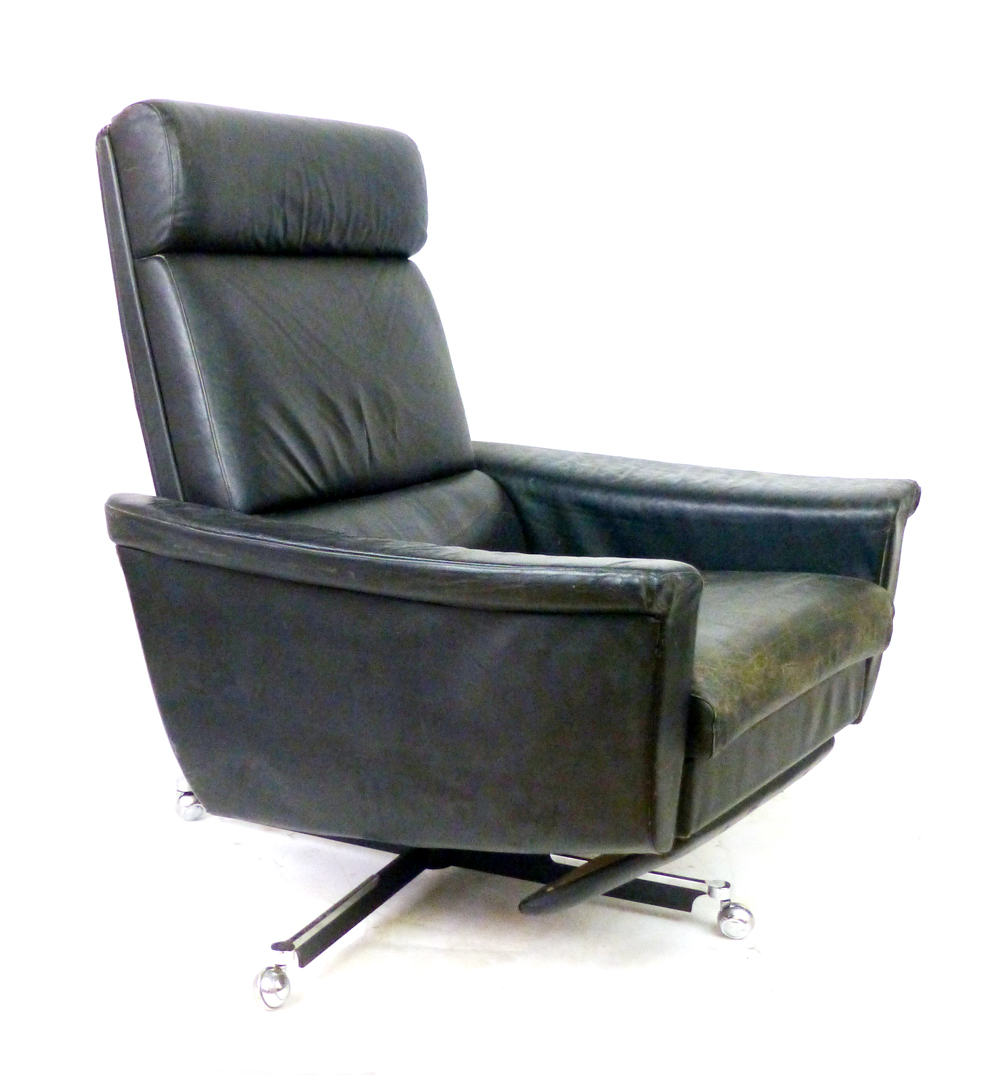 A 1970's black leather highback reclining armchair on a chromed five-star swivel base CONDITION - Image 2 of 4