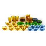 A group of moulded glass tea sets in blue, green and orange CONDITION REPORT: Good