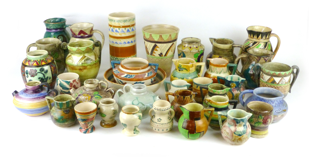 A group of thirty five pottery jugs, bowls and vases by Shorter & Sons including an Art Deco squat