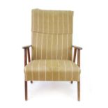 A 1970's teak and fabric highback lounge armchair  CONDITION REPORT: Generally good, no major rips