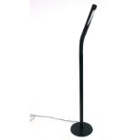 A 1980's single spot standard lamp in black with an adjustable shade  CONDITION REPORT: Dents,