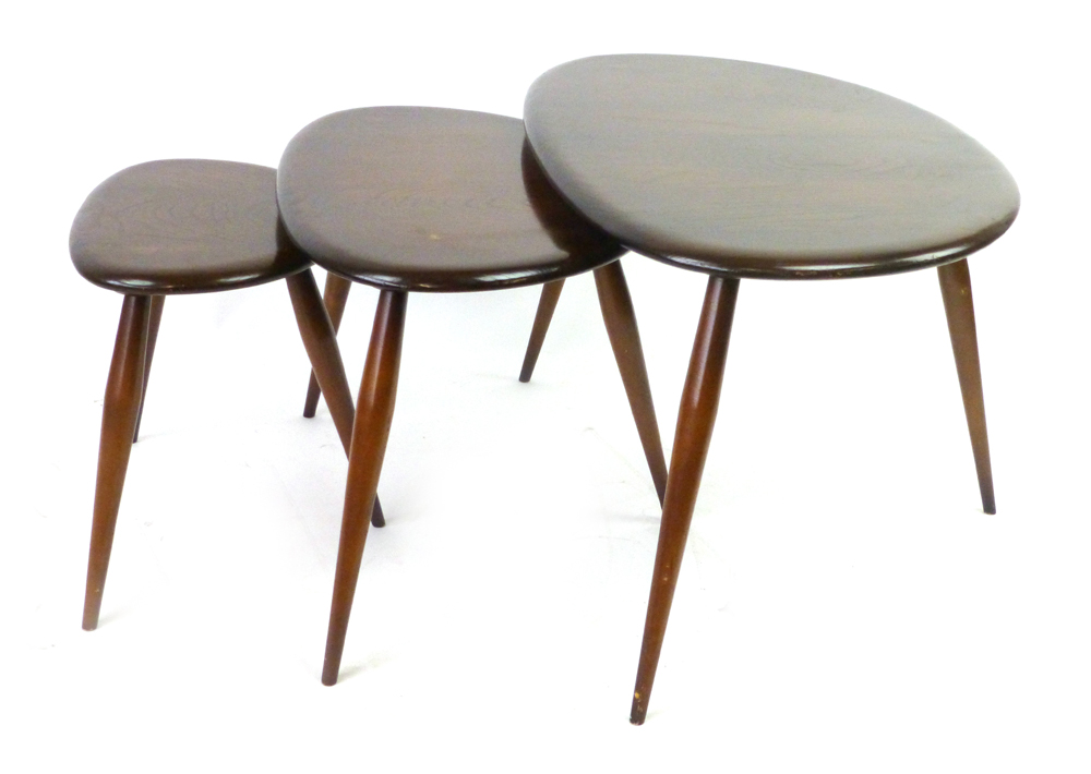 A nest of three Ercol pebble coffee tables in stained ash and beech, max l. 65 cm CONDITION - Image 2 of 3