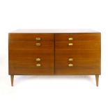 A 1960's teak chest of eight short graduated drawers on tapering legs, w. 119 cm CONDITION REPORT:
