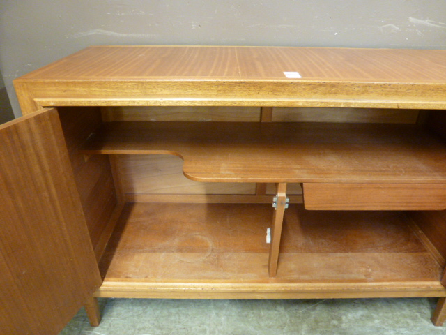 David Booth for Gordon Russell Ltd, a walnut and crossbanded 'Helix' sideboard, the two doors - Image 18 of 25