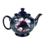 A Moorcroft teapot and cover in the Anemone pattern, impressed marks, h. 14cm  CONDITION REPORT: