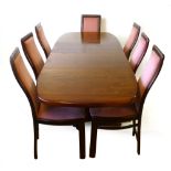 A Skovby stained cherrywood extending dining table, with additional leaf, max l. 184 cm, together