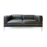 Robin Day for Habitat, a 'Forum II' two-seater sofa, the black leather seats enclosed by an oak