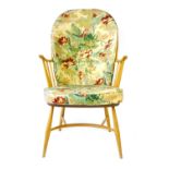 An Ercol elm and beech Windsor-type chair  CONDITION REPORT: Structurally sound, wear in places,