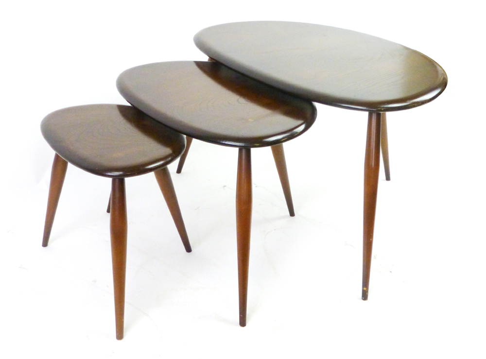 A nest of three Ercol pebble coffee tables in stained ash and beech, max l. 65 cm CONDITION - Image 3 of 3