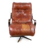 A 1970's bentwood and brown leather lounge armchair on a brown aluminium five-star base CONDITION