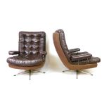 A pair of 1970's brown leather and button upholstered lounge armchairs on aluminium five-star bases