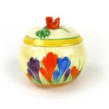 Clarice Cliff for Newport Pottery, a 'Crocus' pattern sugar bowl with cover, d. 9 cm CONDITION