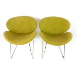 A pair of 1960's semi-circular lounge chairs on chrome tubular frames CONDITION REPORT: Fraying