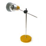 A 1970's Italian adjustable aluminium desk lamp with an orange shade and base CONDITION REPORT: