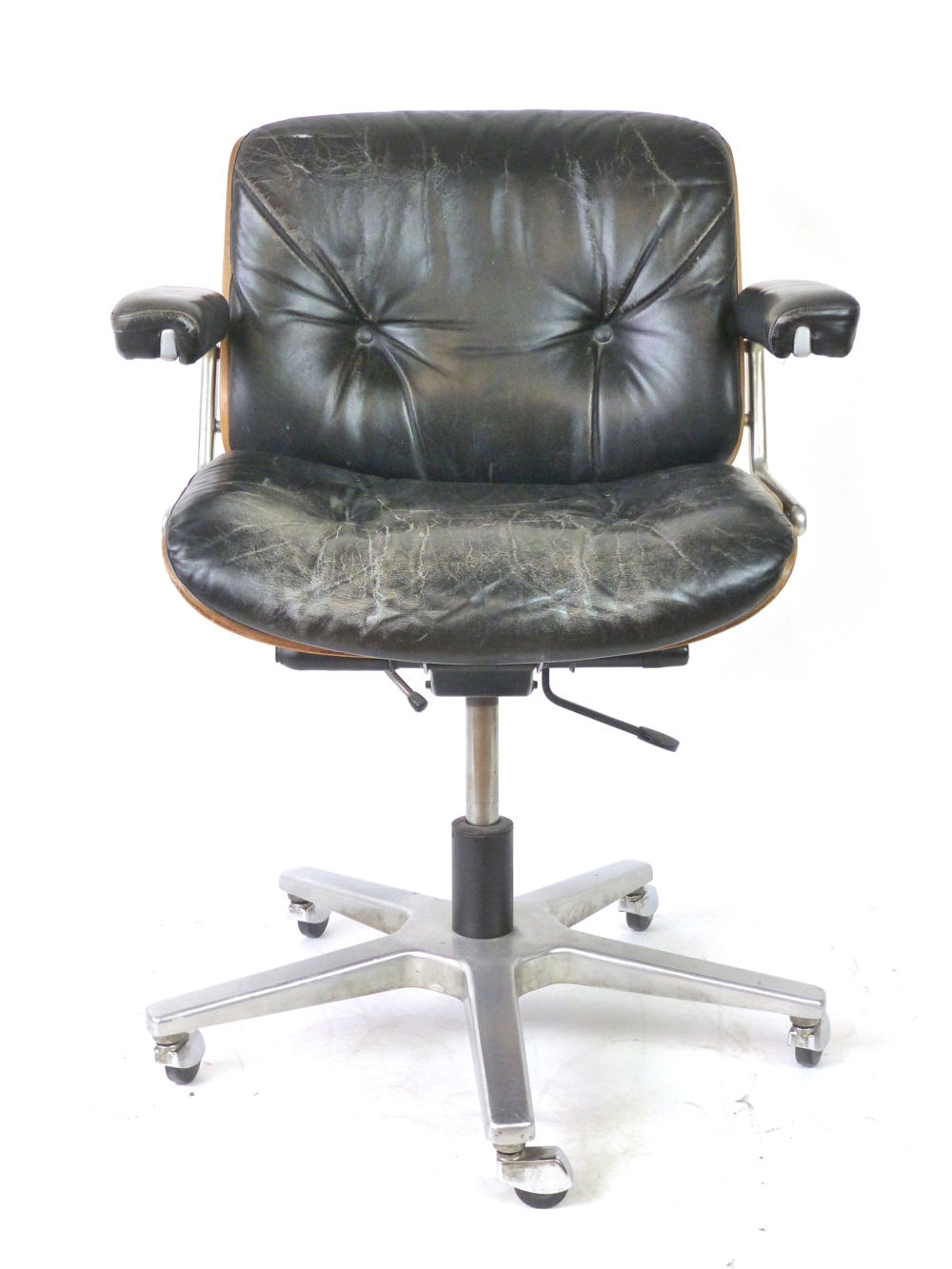 A 1970's bentwood and black leather office armchair on a five-star swivel base, by Giroflex