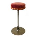 Industrial Design: a 1950's barstool with a mahogany and upholstered top and a steel adjustable base