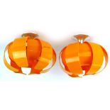 A pair of 1970's orange perspex ceiling lights with aluminium trumpet-shaped fittings CONDITION