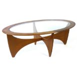 A G-Plan 'Astro' teak and glass oval coffee table of typical form, l. 123 cm CONDITION REPORT: No