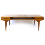 A Dyrlund 1960's teak rectangular coffee table with two freize drawers on tapering legs of organic