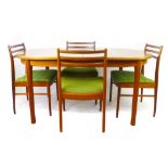 A McIntosh teak oval extending dining table together with a set of four matching chairs CONDITION