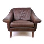A Danish brown leather armchair on mahogany turned legs by Eran CONDITION REPORT: Structurally sound