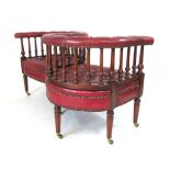 A mahogany framed conversation chair, the 'S' shaped back on turned supports, buttoned seats and