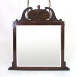 A George lll style mahogany over mantle mirror, central plaque initialled GR lll, above a bevelled