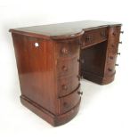 An late Victorian mahogany ladies reverse breakfront writing desk, a pair of bow fronted runs of