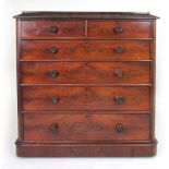 A Victorian mahogany chest of two short and three graduated long drawers, with turned pulls. h.