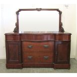 A late Victorian mahogany mirror backed sideboard, shaped rectangular mirror above a serpentine base