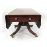 A Victorian mahogany Pembroke table, rounded rectangular top with pair of flaps, single drawer,
