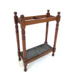 A late Victorian mahogany framed, two section stick stand with metal drip tray. h. 69 cm, w. 51