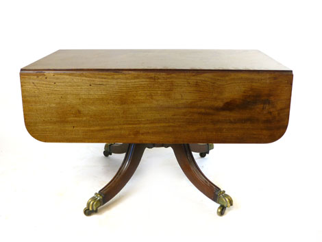 A Victorian mahogany Pembroke table, rounded rectangular top with pair of flaps, single drawer,