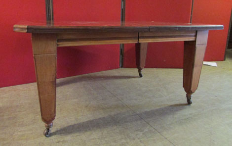 A late Victorian mahogany extending dining table, canted rectangular form on tapering square section - Image 2 of 2