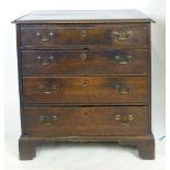 A George lll oak chest of four graduated long drawers with brass swing handles. h. 79 cm, w. 81