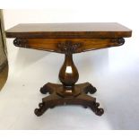 A Rosewood Foldout Card table, early/mid 19th century, rounded rectangular top and octagonal